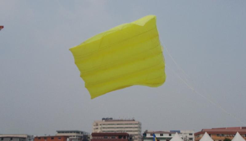 Ram air pilot kite leaning off because of rearward lateral area disposition. Sarawak, August 2009