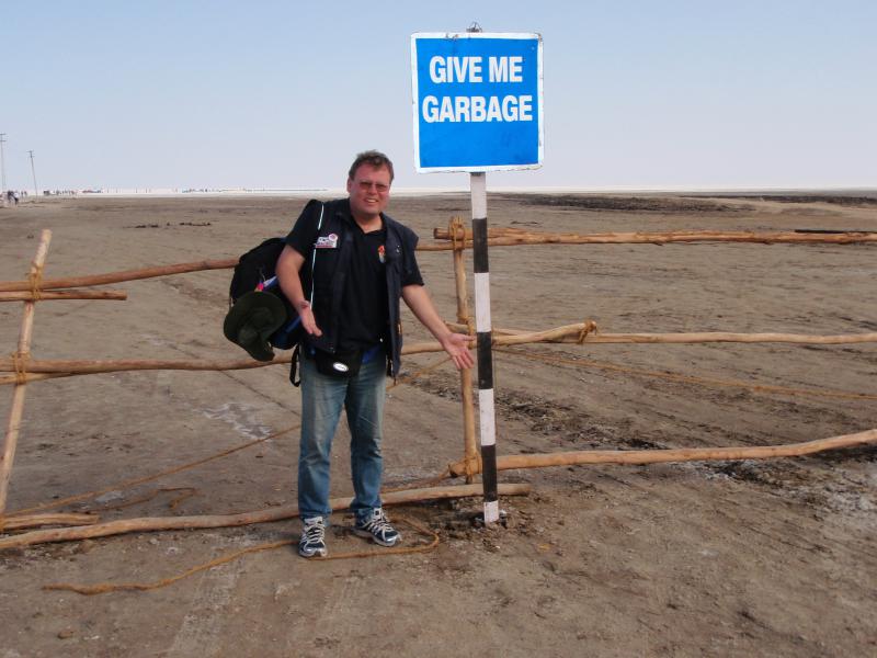 Axel Kostros and garbage sign, Kutch '11
