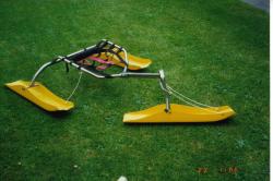 <p>Ski Buggy (Snow) on lawn c1995</p>