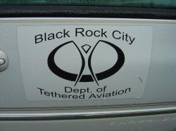 <p>21.9 Dept of Tethered Aviation sign from Burning Man, 2004</p>