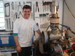 <p>Phillips engine and Paul Buckley, smiling,  first run.</p>
