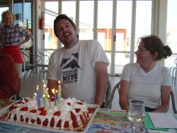 <p>Addrianne, Andrew and Kathy Beattie,  birthday cake, Dino's, Cervia '04</p>